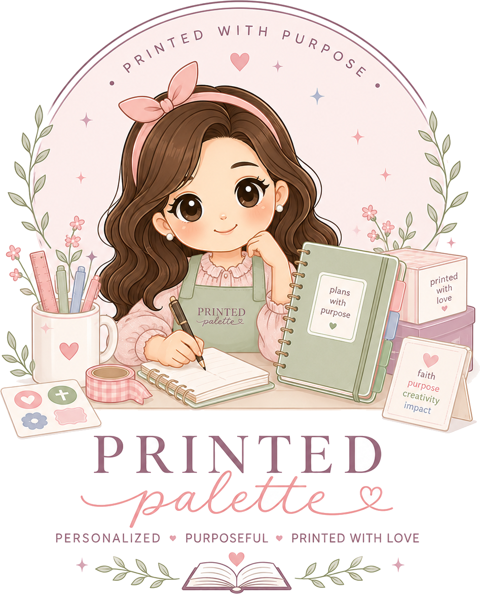 Lettie, the Printed Palette mascot, planning at her studio desk surrounded by stationery
